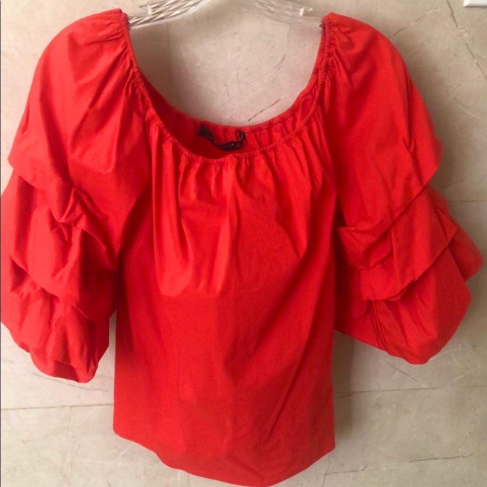 Beautiful red blouse with amazing sleeves